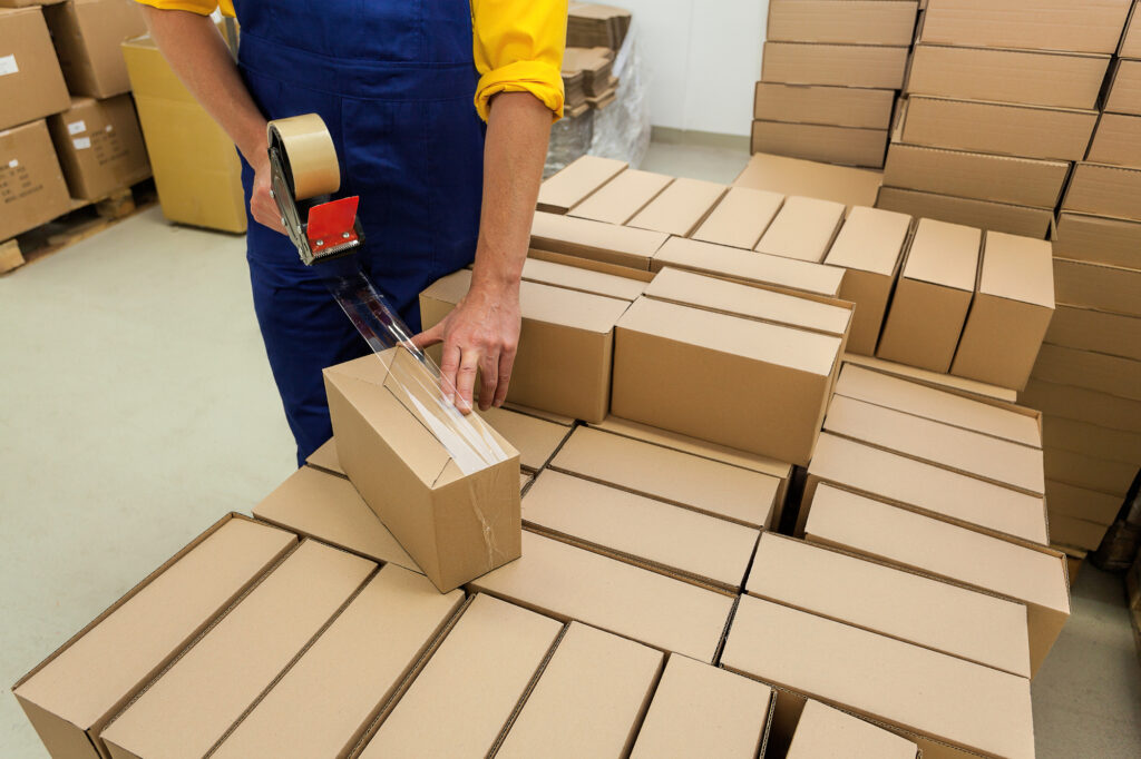 Person Packing Boxes