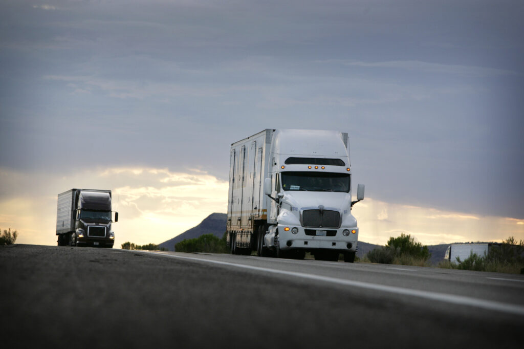 White Trucks On The Highway